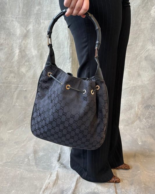 Vintage 90s Gucci by Tom Ford Black GG Canvas Bamboo Drawstring Shoulder Bag