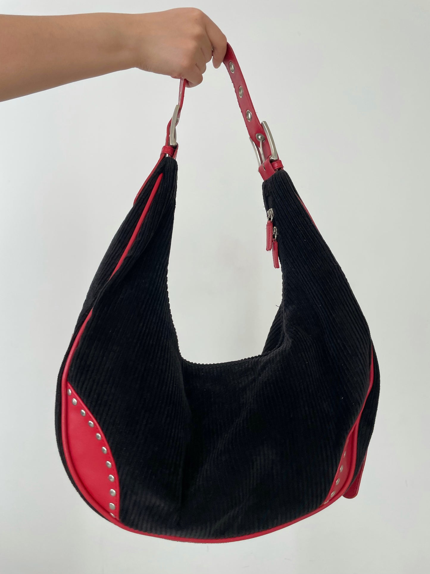 T...T Black Moon Shaped Corduroy Bag with Red Straps and Silver Grommets